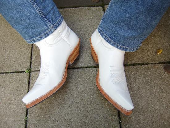 white jeans and cowboy boots